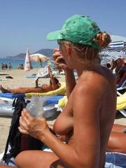 Sexy mature wives topless at the beach