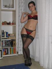 Pretty girlfriend in stockings spreads at